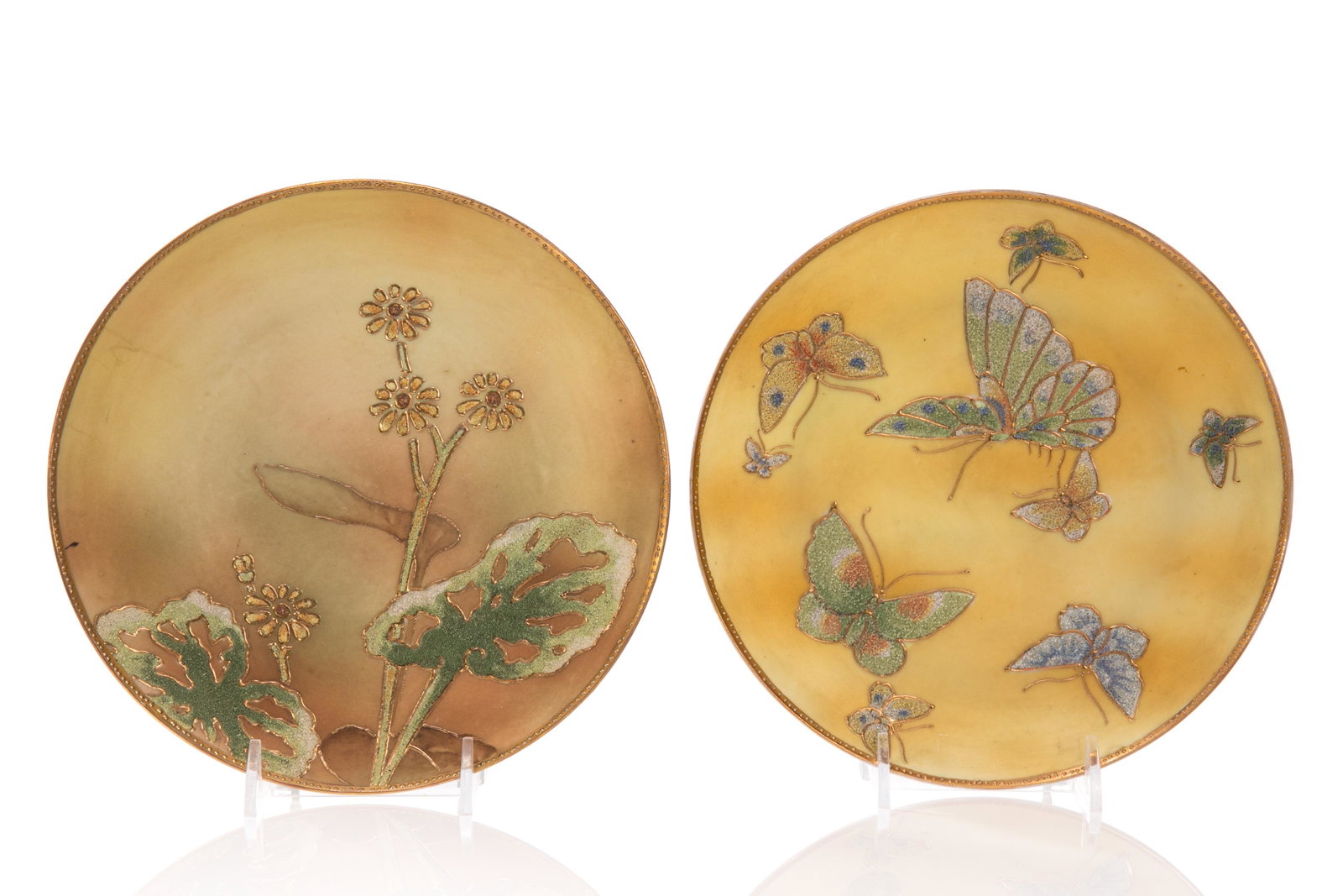 TWO CORALENE NIPPON PORCELAIN WALL PLAQUES: Gradual yellow glazed matte ground with flowers in Coralene, gilded edge. Together with yellow glazed matte ground with butterflies in Coralene, gilded edge. Japanese,Royal Kinran U.S. Patent 1909 mar