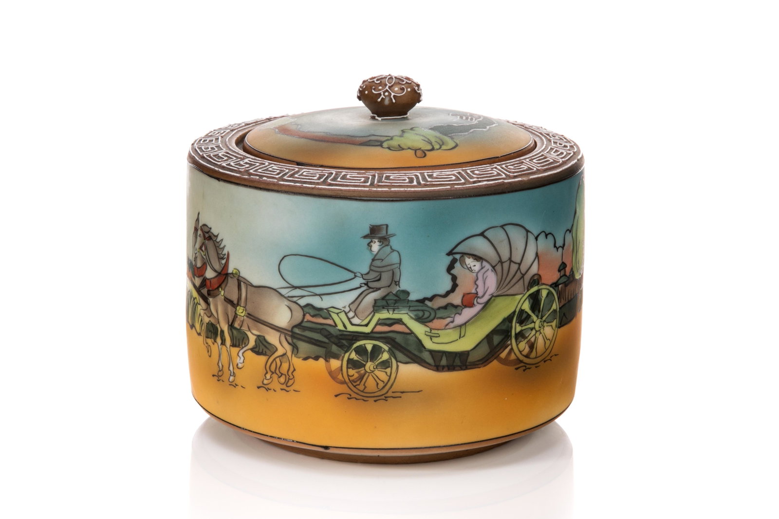 NIPPON HORSE DRAWN CARRIAGE PORCELAIN HUMIDOR: Matte glazed body with hand painted horse drawn carriage scene with white moriage design on top of jar. Japanese, green maple leaf Nippon mark. H. 12.5 cm (5 in.)