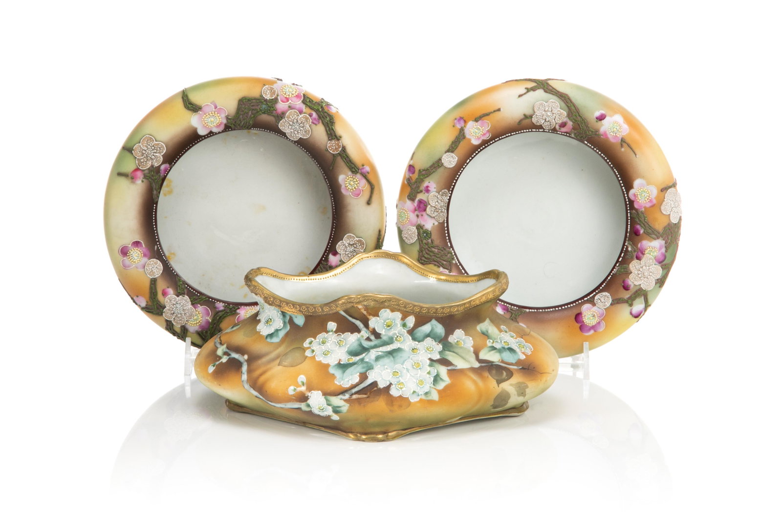THREE NIPPON MORIAGE PORCELAIN BOWLS: A pair of spittoons in matte glaze with cherry blossom moriage. Together with a matching scalloped vase with moriage flowers. Japanese, green maple leaf Nippon mark. H. of tallest: 8.5 cm (3 3/8 in.)