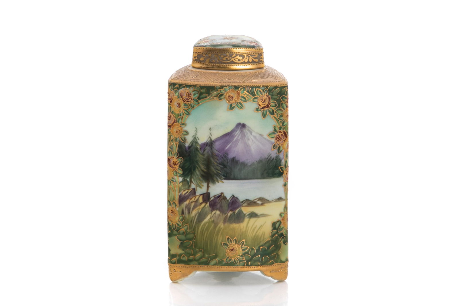 NIPPON MOUNT FUJI PAINTED PORCELAIN TEA CADDY: With landscape painting surrounded by gilded roses on the border. Original porcelain cover and lid. Japanese blue M in wreath mark, early Noritake. H. 16 cm (6 1/4 in.)