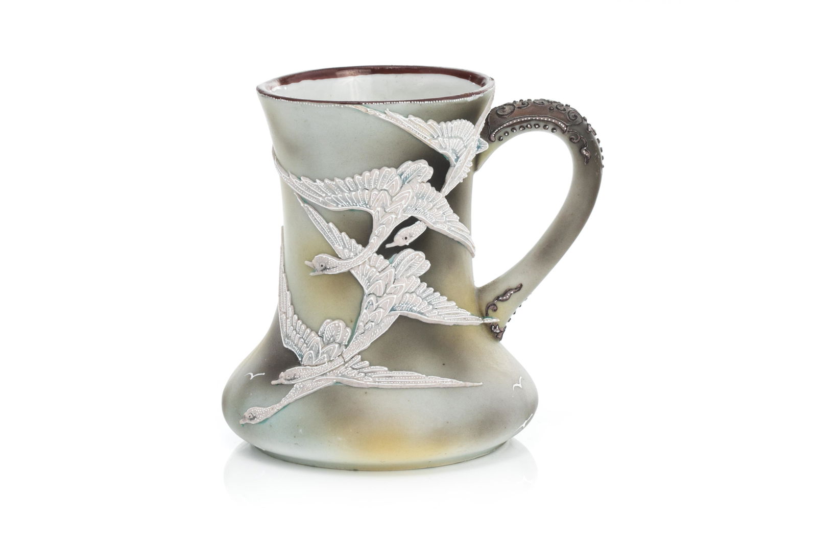 NIPPON SWAN MORIAGE PORCELAIN VASE: Gradual grey matte glazed ground with moriage flying swans. Japanese, green maple leaf mark, early Noritake. H. 13 cm (5 in.)