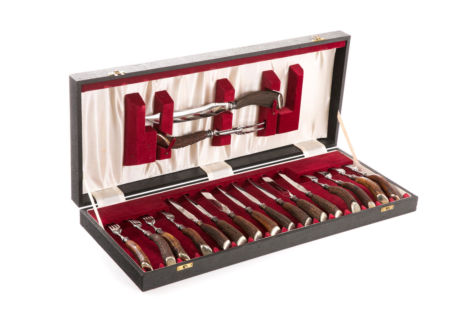 18 PCS ASPREY BONE HANDLE CARVING SET: An Asprey London carving set, with carved bone handles of a dark patina and stainless blades. Comprinsing eight dinner forks, eight dinner knives and large carving knife and fork, housed in a leather