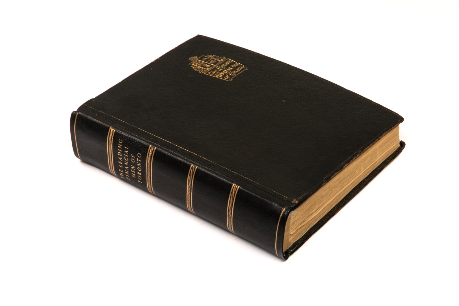THE LEADING FINANCIAL MEN OF TORONTO: McCormick, Edwin. LEADING FINANCIAL AND BUSINESS MEN OF TORONTO (Toronto: Edwin McCormick, 1912). 100 color tipped-in portraits with accompanying biography. Black leather covers with gold lettering. G