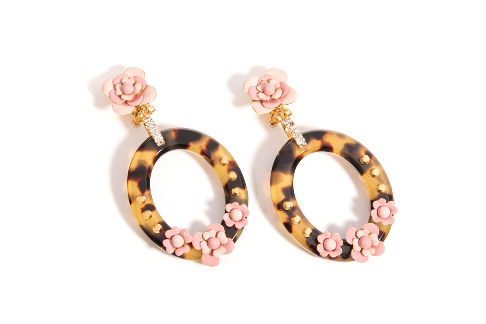DESIGNER PRADA FAUX TORTOISESHELL EARRINGS: Accented with pink enamel flowers and clear rhinestones, clip on fittings, signed. L. 9cm