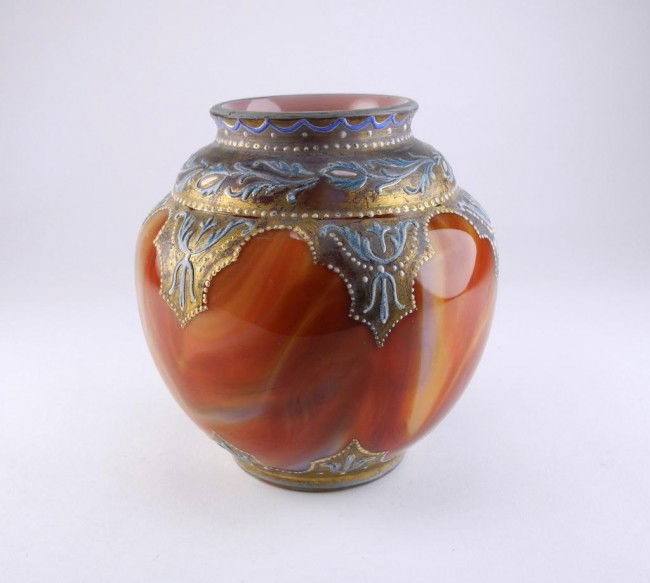 LOETZ CASED MARMORIERTES GLASS VASE, LATE 19TH CE: Pink interior and swirled carnelian exterior with gilt and blue enamel around the base and rim. H 11 cm. (4 3/8 in.)