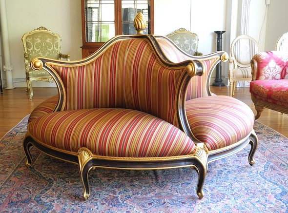 CHRISTOPHER GUY CLASSIC ROUND SOFA: American Revival round sofa with silk upholstery and handcrafted detail. 20th century.