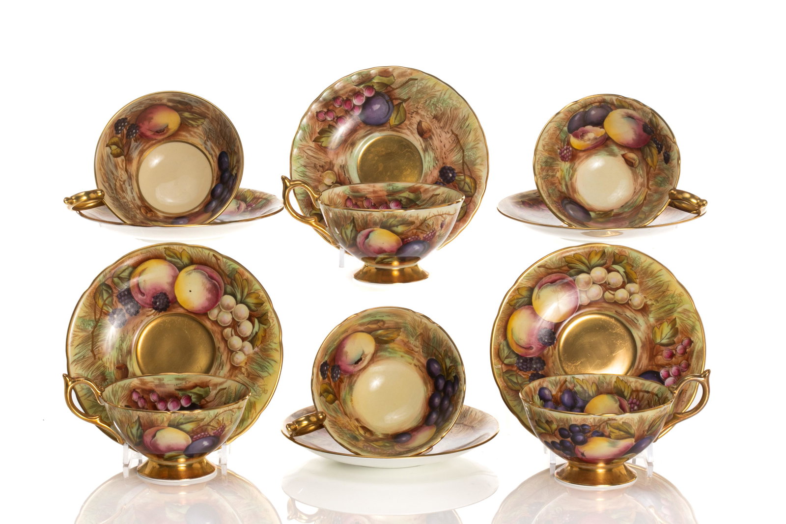 SIX AYNSLEY PORCELAIN FRUIT & GOLD CUPS & SAUCERS: Six Aynsley hand painted bone china cups and saucers with gilding and scalloped edge, pattern number 1037. Signed N. Brunt with marks for Aynsley to base, circa 1950s. Dia. of saucer: 14cm (5 1/2in)