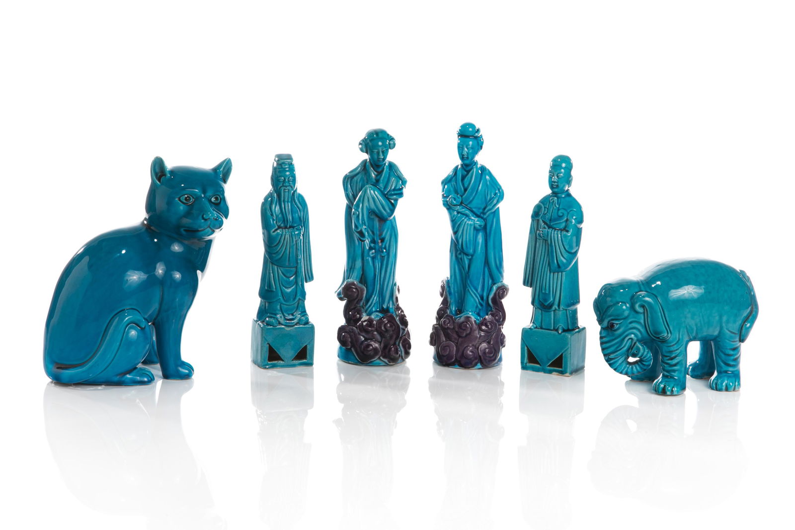 CHINESE TURQUOISE GLAZE PORCELAIN FIGURE & ANIMALS: Chinese, including four standing statue of a pair of Daoist figures and two female immortals. Together with an elephant and a cat. H. 23.4 cm (9 1/4 in.)
