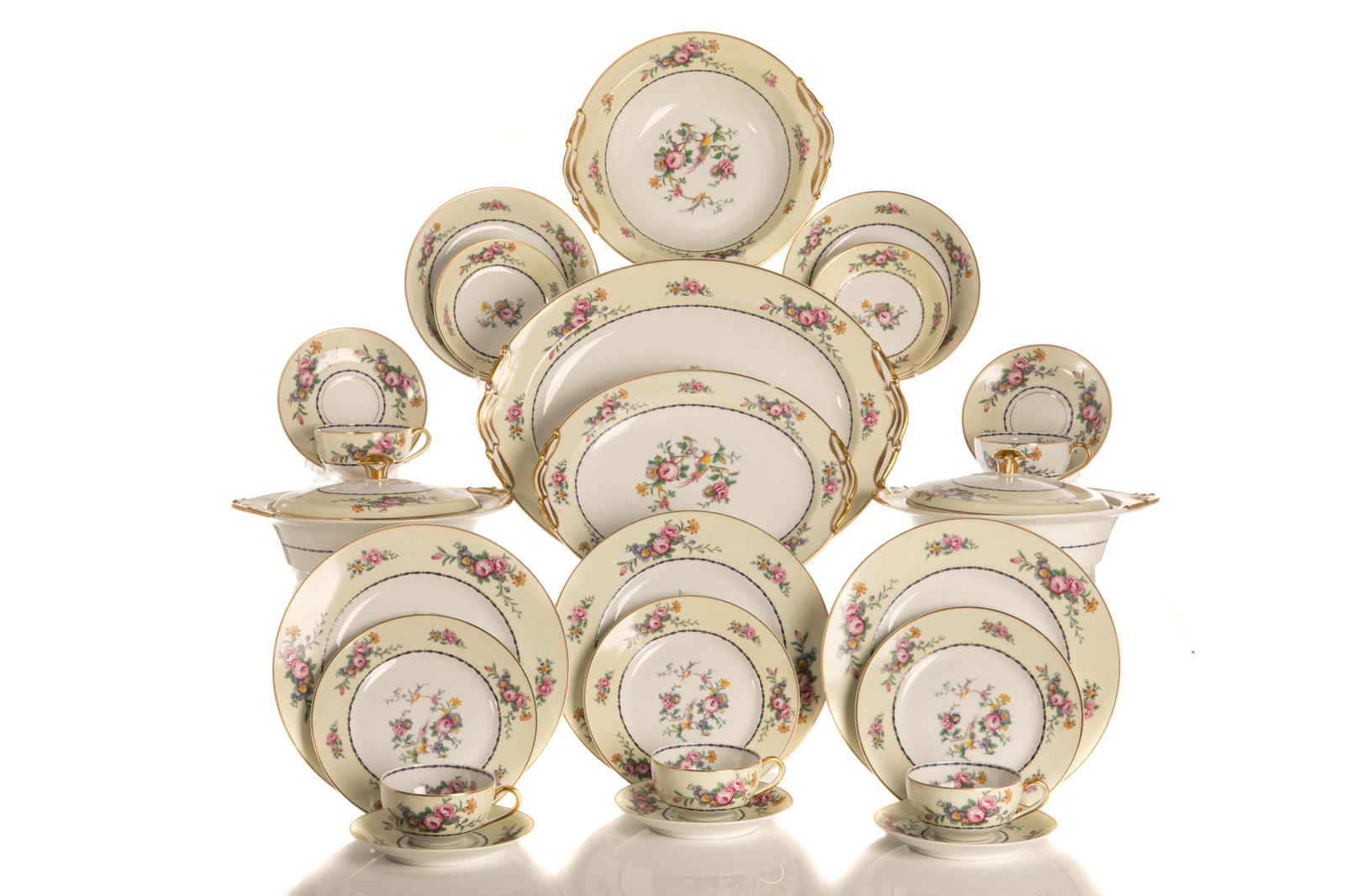 LIMOGES SPRINGTIME PORCELAIN DINNER SERVICE: Service for twelve. Spring Time pattern, marked B & Co Limoges France, 25 L. Bernardaud & Co. Limoges, Spring Time.