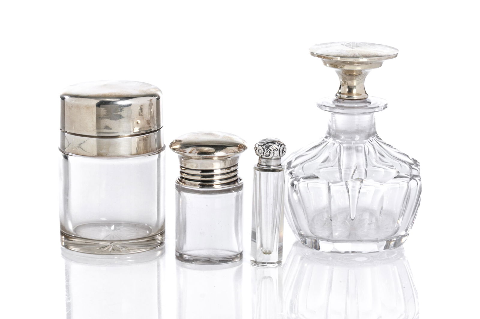 FOUR ENGLISH SILVER & CUT GLASS VANITY BOTTLES (1 of 6)