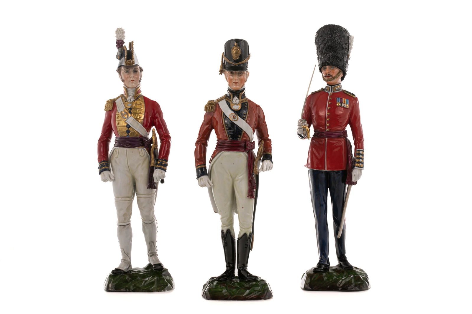 THREE GERMAN PORCELAIN MILITARY FIGURINES (1 of 5)