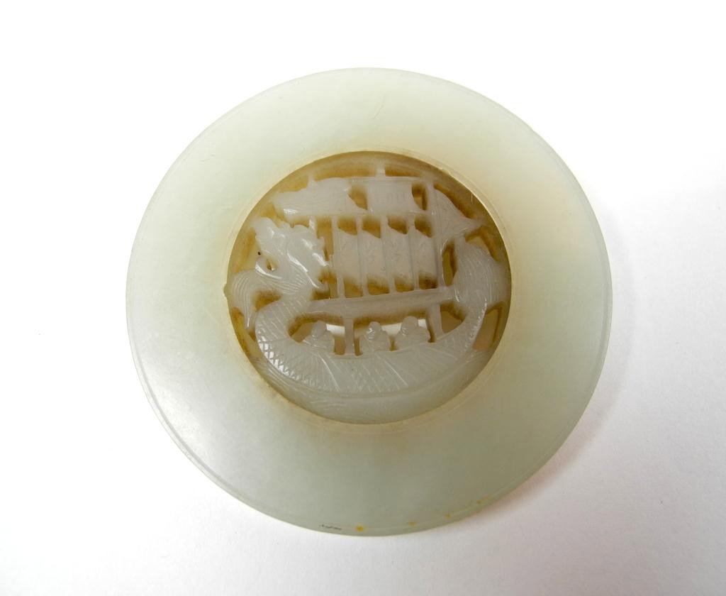 CHINESE CARVED SMALL WHITE JADE PENDANT DISC: With a mobile disc in centre carved as a Chinese navy boat in dragon shape. W. 5.7cm (2.2 in.)