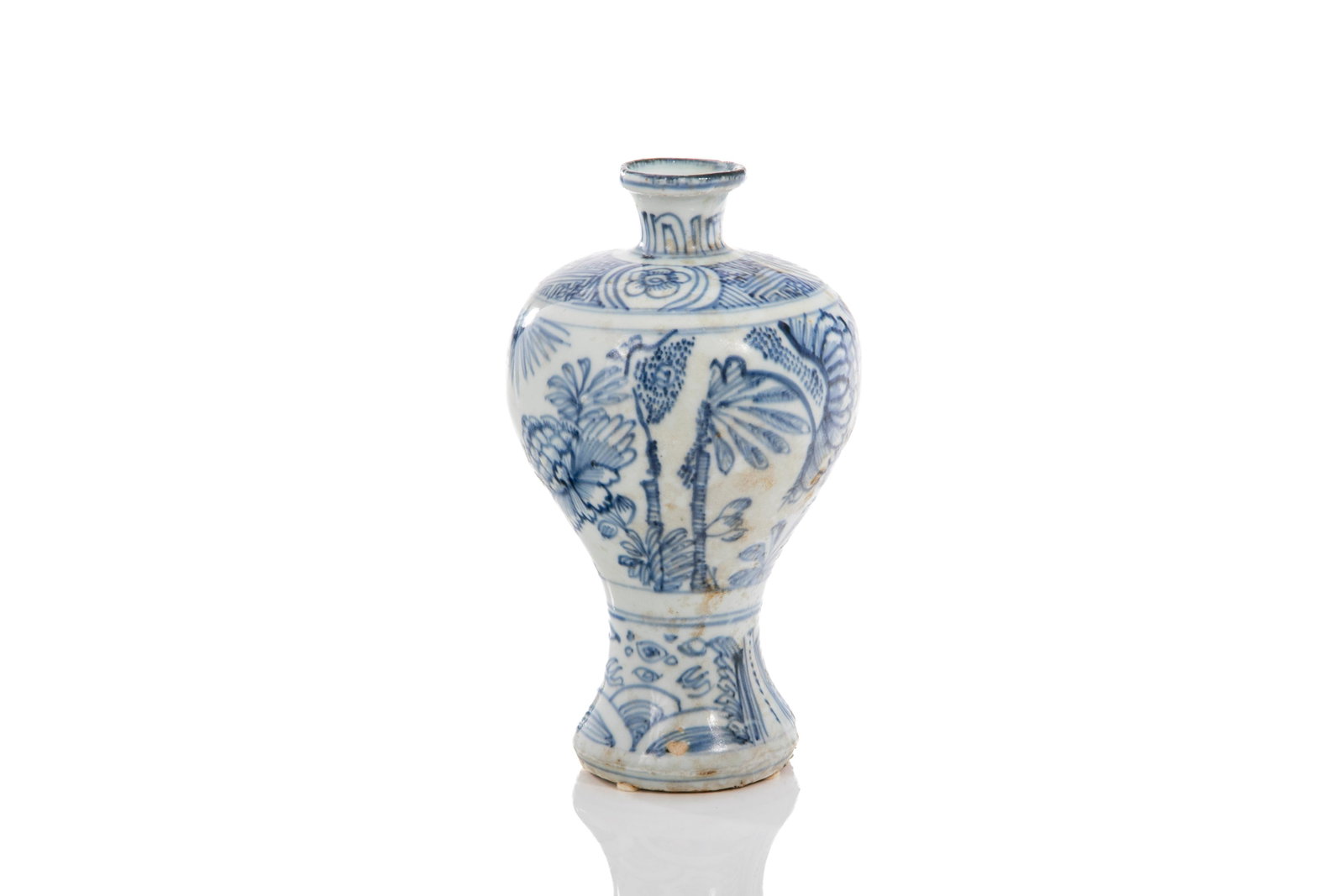 SMALL CHINESE BLUE & WHITE PORCELAIN MEIPING VASE: Chinese, late Ming dynasty. Meiping vase featuring a bird and flower garden scene on the body and small flower panels against interlocking swastika ground decorated to the shoulder. With flaringmouth 