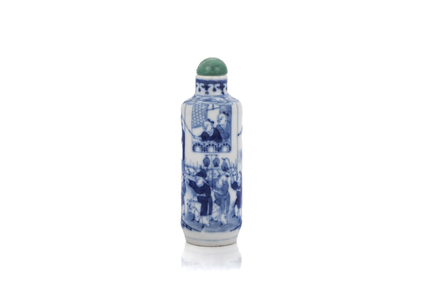 CHINESE BLUE AND WHITE PORCELAIN SNUFF BOTTLE: Chinese,Qing dynasty. In blue and white palette, featuring boys at play design on the cylindrical body with auspicious symbols. Base and foot unglazed. Having later stopper and naturalspoon. H. 8.4 cm