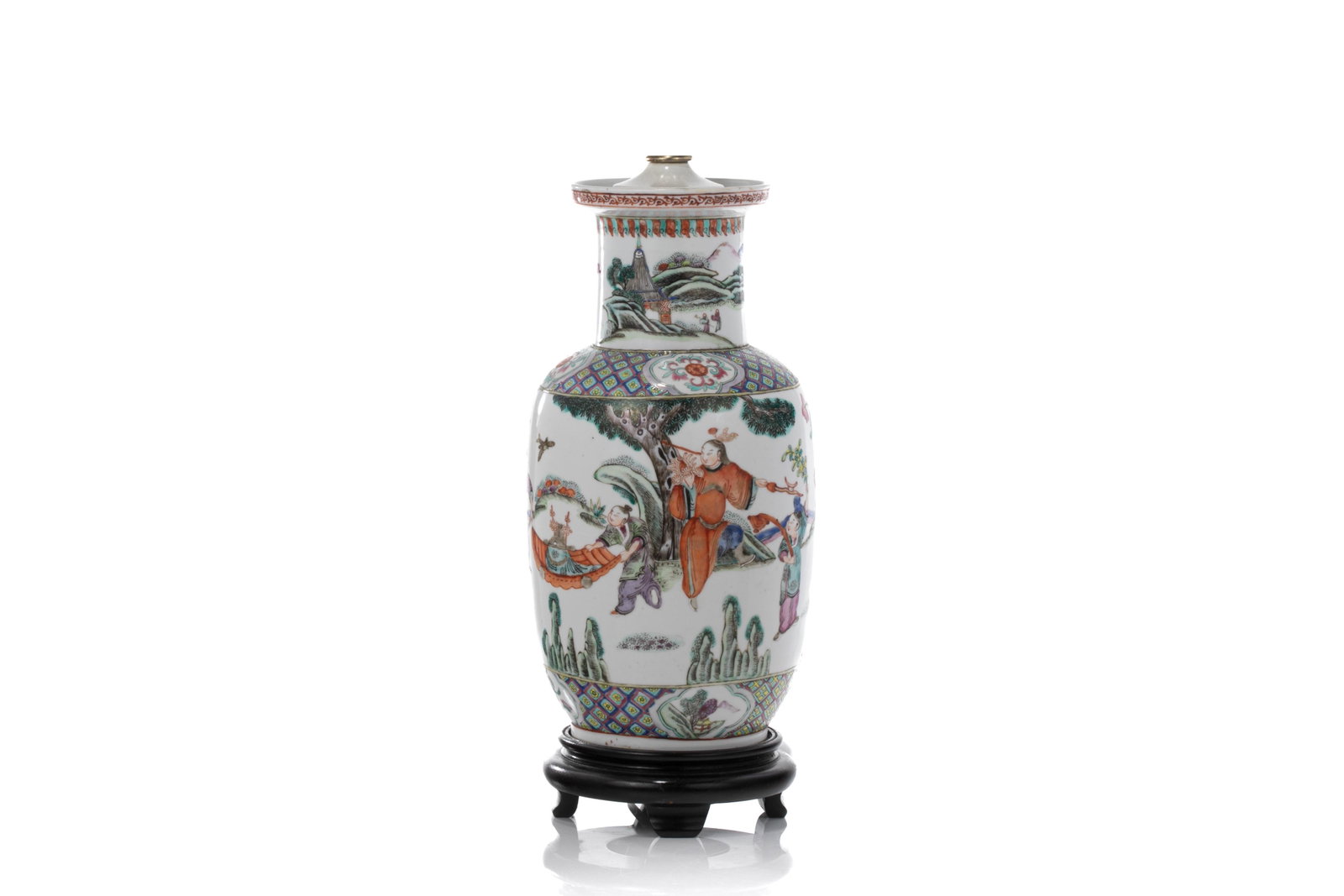 A CHINESE FAMILLE ROSE VASE MOUNTED AS LAMP: Chinese, with mallet form cylindrical neck and everted mouth rim. Painted with landscape figural scenes to the neck with scrolling flowers to shoulder. Decorated with children at play scenesto the bod