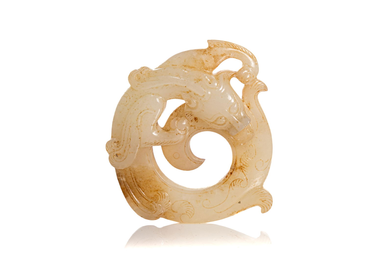 A WHITE AND RUSSET JADE CHILONG HUAN DISC (1 of 3)
