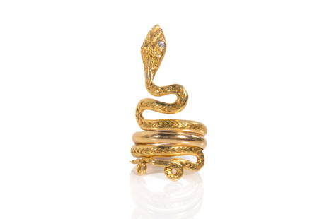 18K GOLD LALAOUNIS SNAKE RING, 7.6g: 18k yellow gold snake shaped ring, by Ilias Lalaounis, Greece,set with two round brilliant cut diamond eyes, marked 750 Lalaounis, size 6.