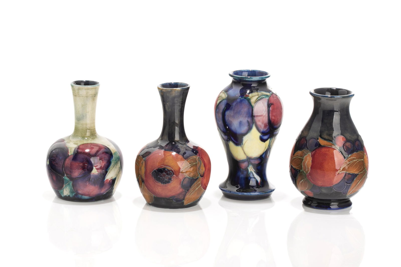FOUR DIMINUTIVE MOORCROFT POTTERY VASES (1 of 3)