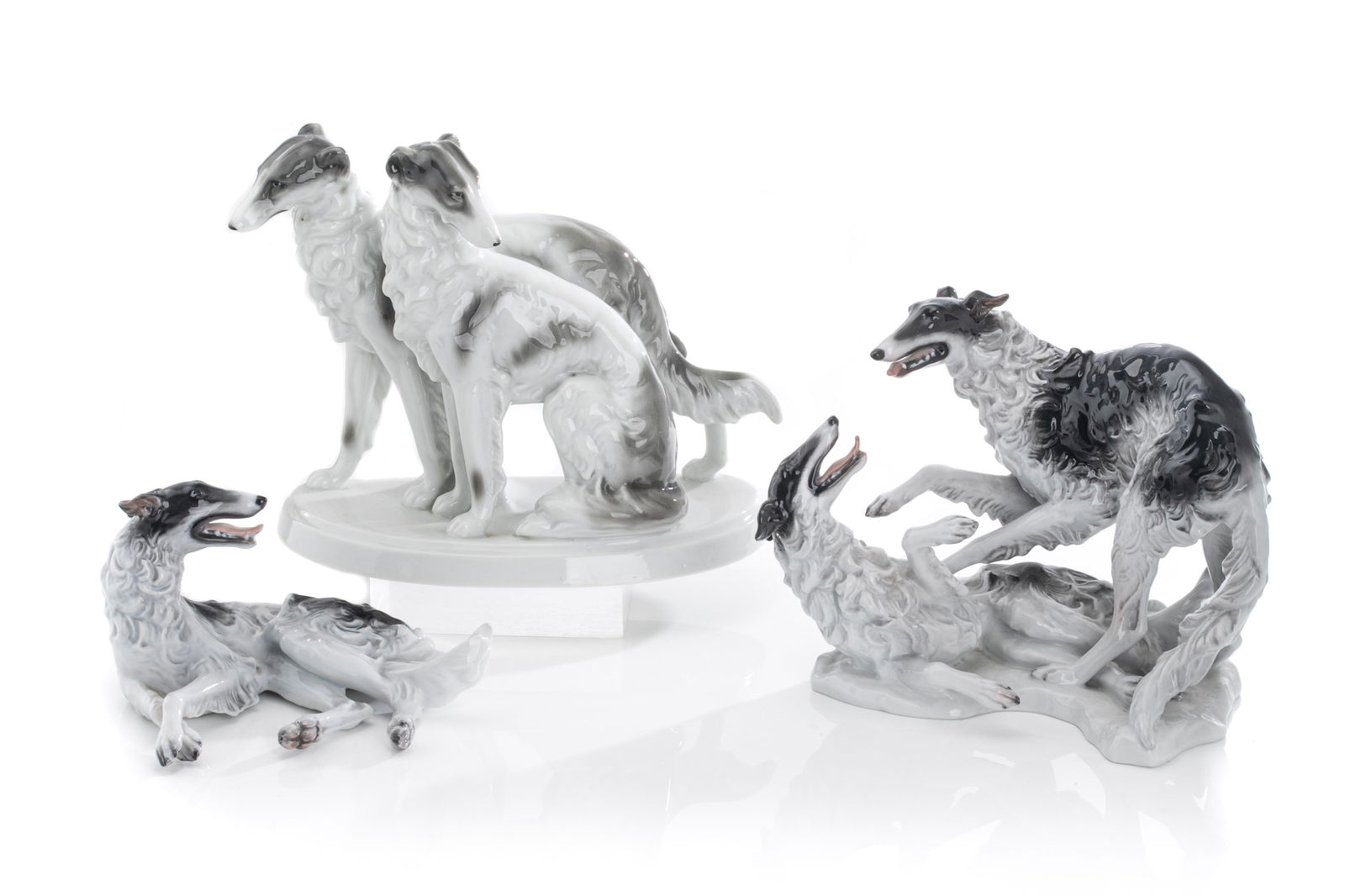 THREE GERMAN PORCELAIN FIGURES OF BORZOIS (1 of 4)