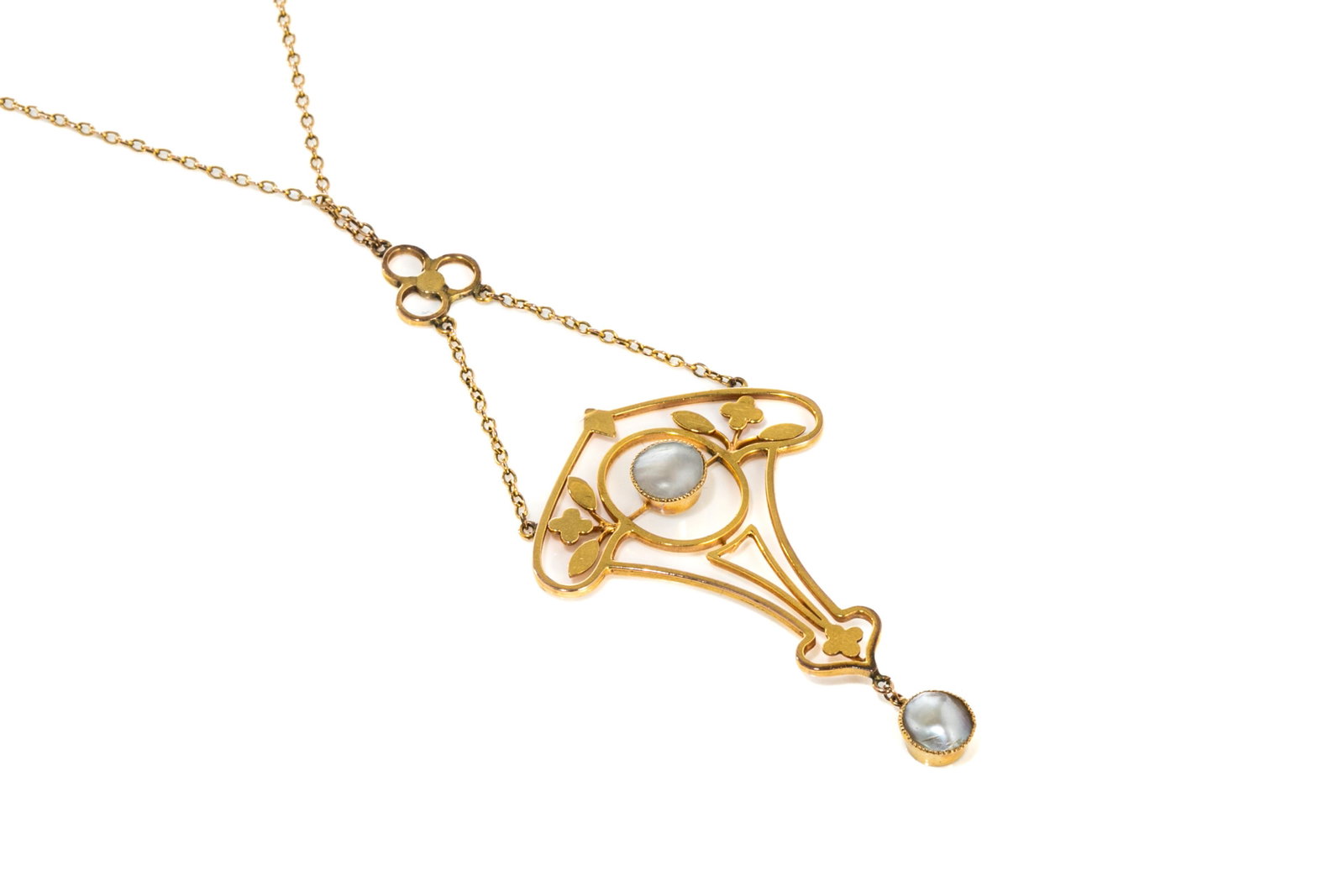 ART NOUVEAU 9K GOLD NECKLACE, 4g: An Edwardian 9k yellow gold floral design necklace, the pendant set with two cultured pearls, on a 9k rose gold chain, barrel clasp, testing 9k. Chain length: 40.6 cm (16 in.)