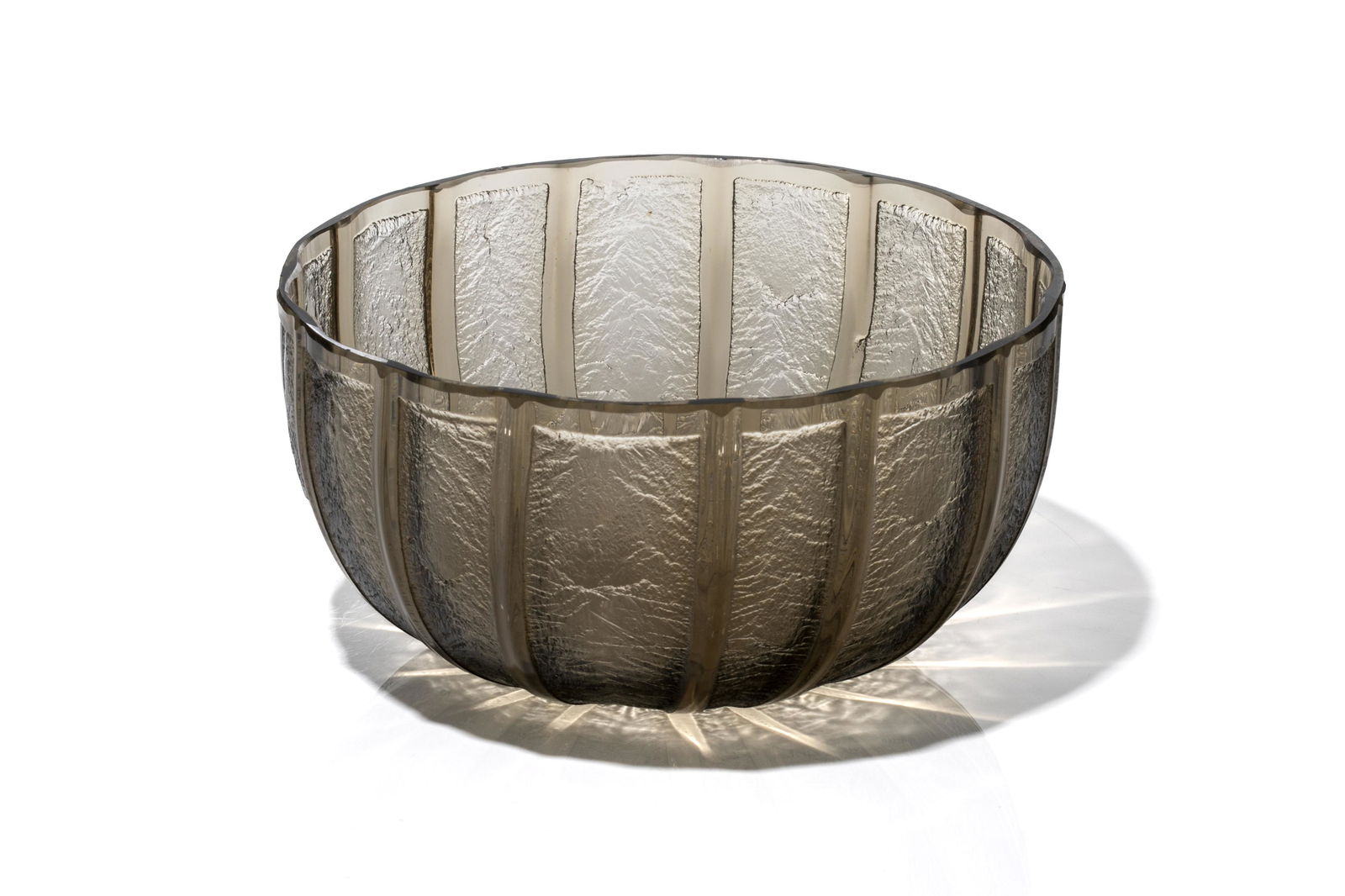 DAUM NANCY ART DECO GLASS BOWL: Ribbed body accented by crackle effect all in a smoky grey glass, inscribed Daum Nancy France to rim of base, circa 1926.Dia 17.5cm (7in)