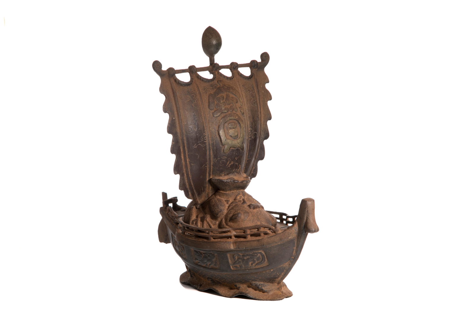 19TH CENTURY JAPANESE IRON TREASURE SHIP: Japanese, 19th century, Edo Period, an iron treasure ship with a huge sail decorated with cloud patterns and one large character "Takaramono" (treasure). H. 35.3 cm (13 7/8 in.), L. 28.6 cm (11 1/4 in