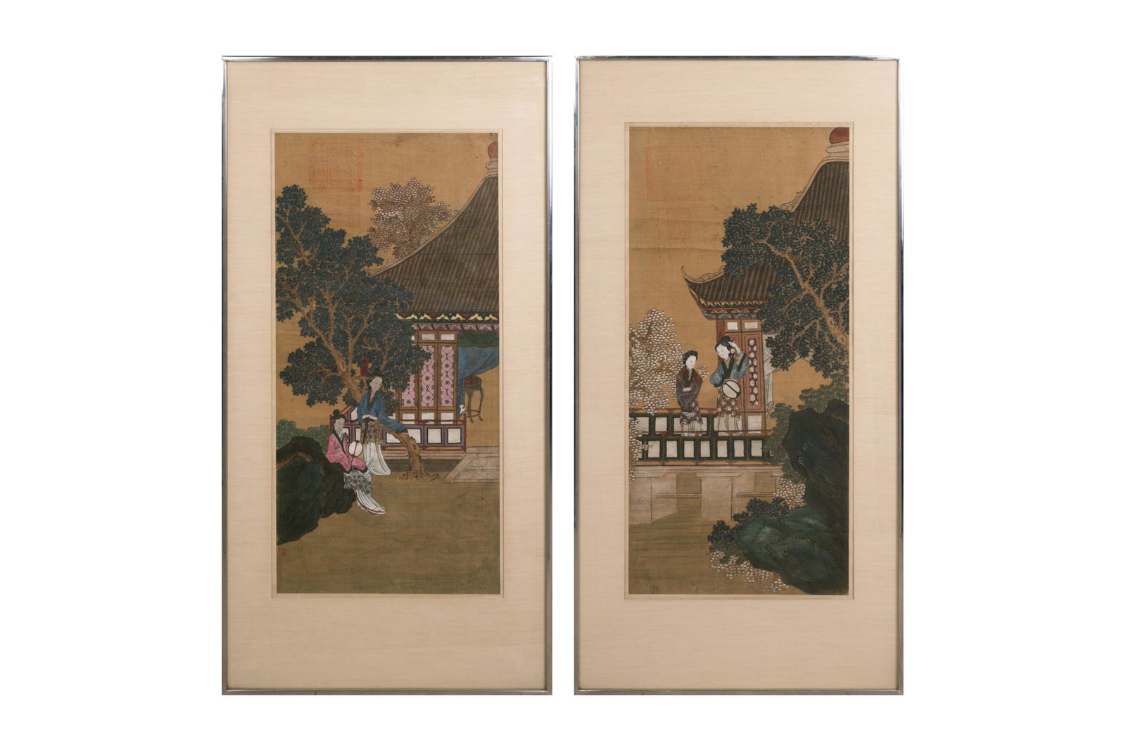 PAIR OF FRAMED CHINESE PAINTINGS: Of maidens in the gardens with Qianlong seal.Each panel 13 x 27 in.Framed and sold by Karl Mann Associates.