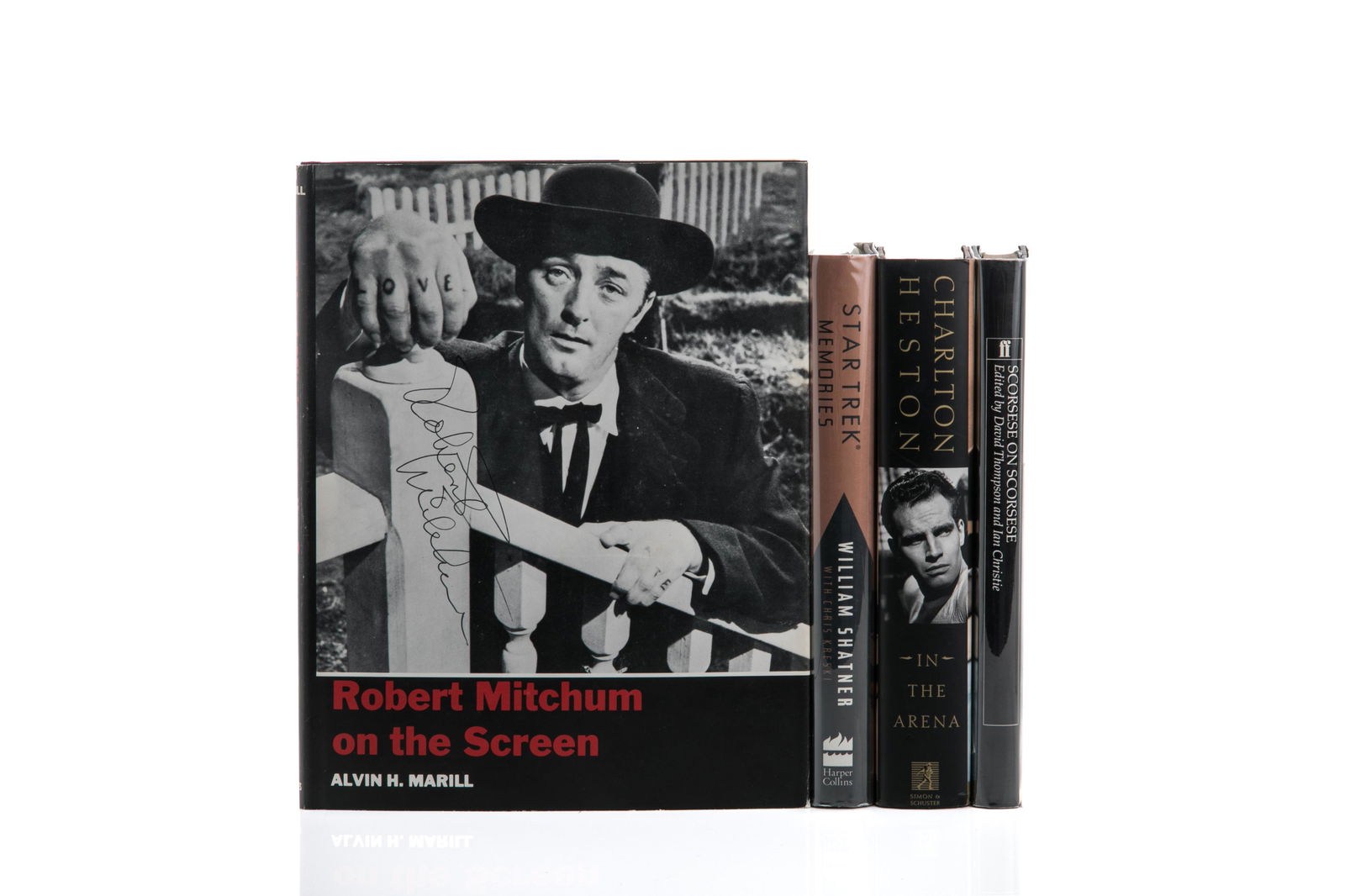 LOT OF AUTOGRAPHED HOLLYWOOD BOOKS (4 VOLS): Includes: Marill, Alvin H. ROBERT MITCHUM ON THE SCREEN (New Jersey: A. S. Barnes, 1978); Signed on front of dust jacket. Shatner, William and Chris Kreski. STAR TREK MEMORIES (New York: Harper Collin
