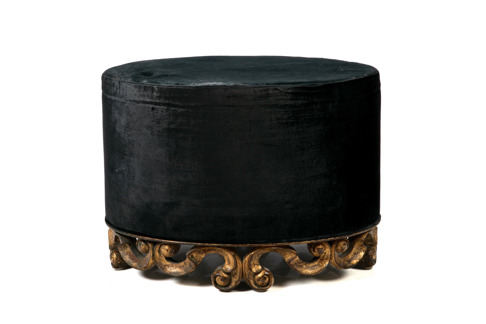DECORATIVE UPHOLSTERED OTTOMAN: Black velvet, with gilt wood base. H. 17 1/2", W. 24 1/4", D. 16 1/2".