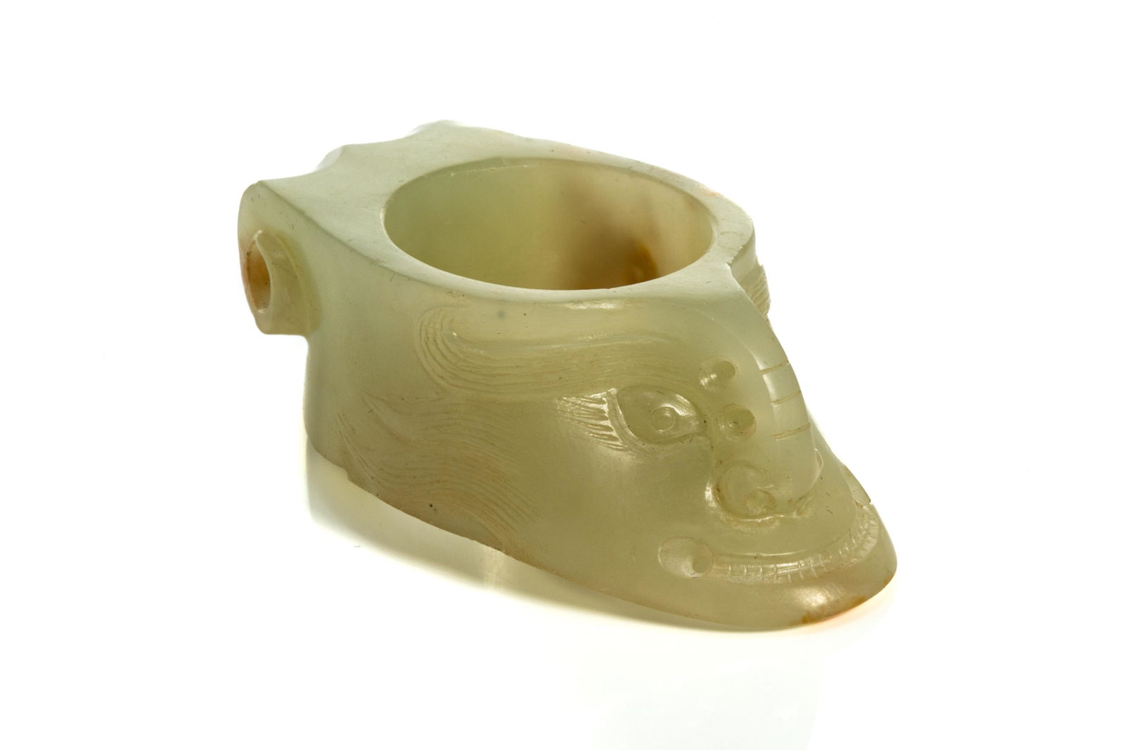 A CHINESE JADE CARVED MYTHICAL BEAST THUMB RING (1 of 5)