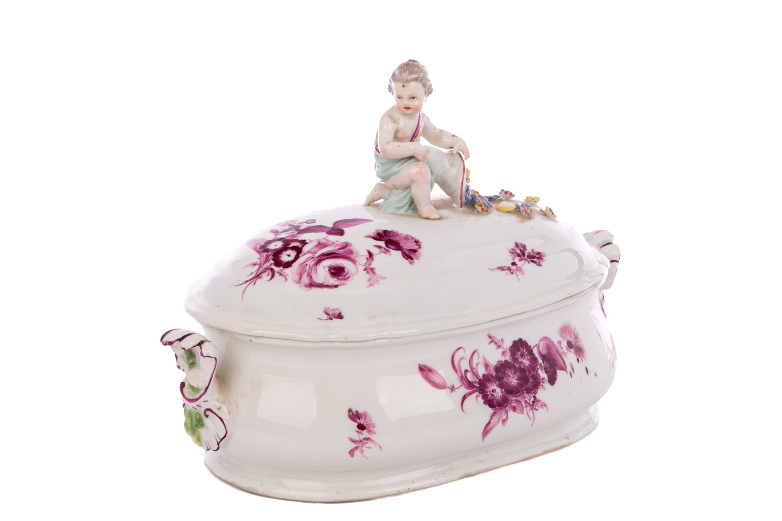 19th C MEISSEN PORCELAIN TUREEN: Puce floral decoration on a white ground, figural putti finial holding a spilling cornucopia of florals. Underglaze crossed swords to base; Meissen, 19th C. L. 27cm (10 1/2in)
