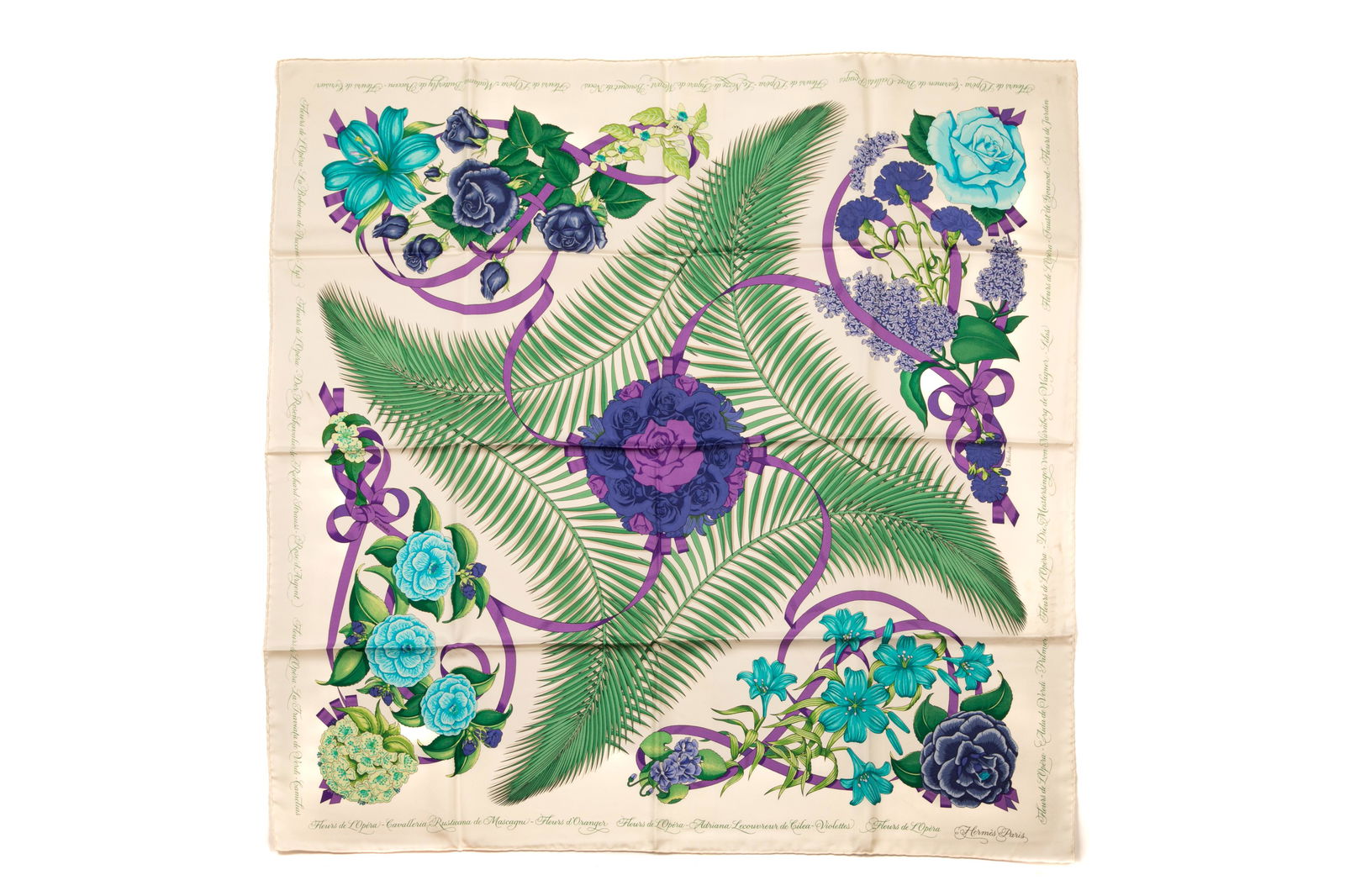 VINTAGE HERMES SQUARE SILK SCARF: Purple and multicolour in "Fleurs de L'Opera" pattern, designed by Julia Abadie. L. 90 cm (35 1/2 in.) Condition report available upon request.