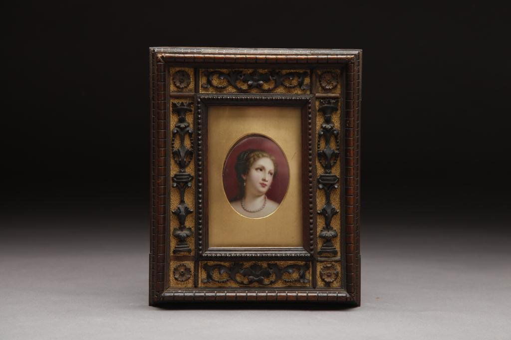 FRAMED GERMAN PORCELAIN PLAQUE: Hand painted plaque of Lady with a Pearl Necklace. In carved Renaissance revival frame. German, 1860. 9 1/2 x 8 in. (24 x 20.5 cm)