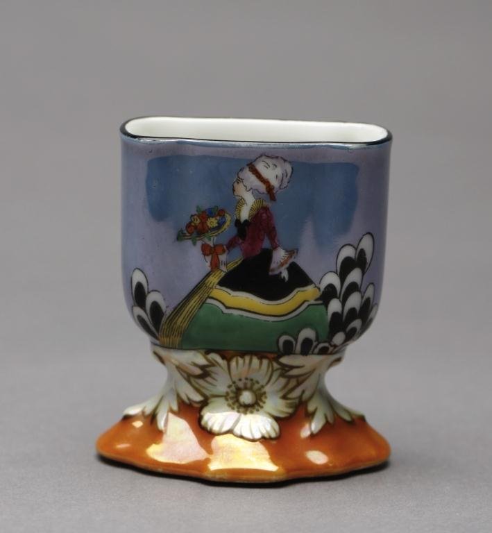 NORITAKE OPEN CIGARETTE HOLDER: Lustre blue and orange ground with a painted lady with bouquet. Red M-in-Wreath. H 7.5 cm. (3 in.)