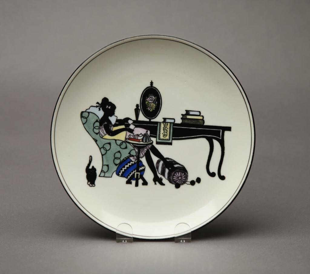 NORITAKE SILHOUETTE PLATE: Of a girl and her cat seated at her desk. Green M-in-Wreath, Dia 21.7 cm. (8 1/2 in.)