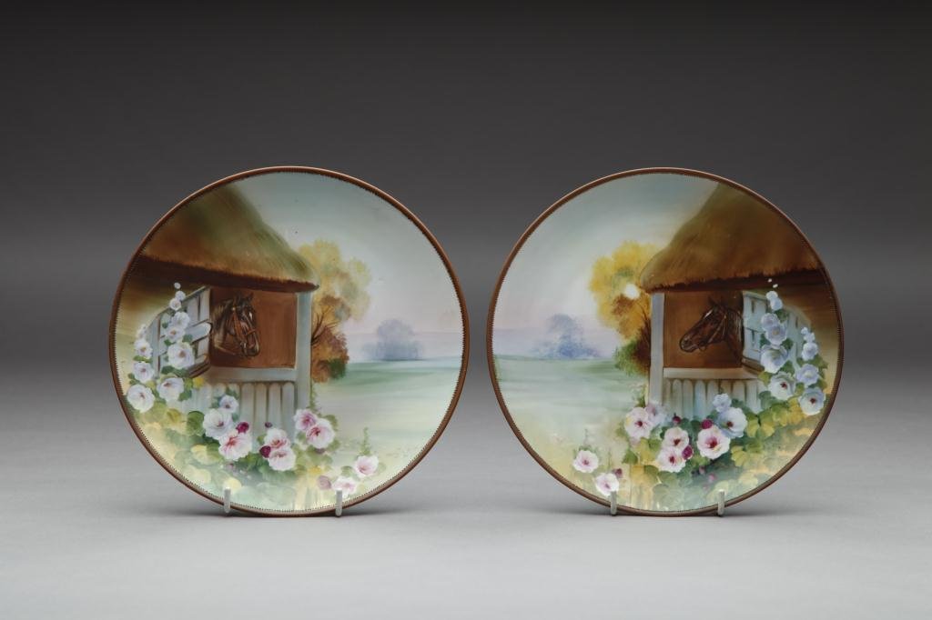 PAIR OF HAND PAINTED NIPPON PLAQUES: Each in reverse with a horse in stable with roses and landscape. Green M-in-Wreath, Dia 22.7 cm. (9 in.)