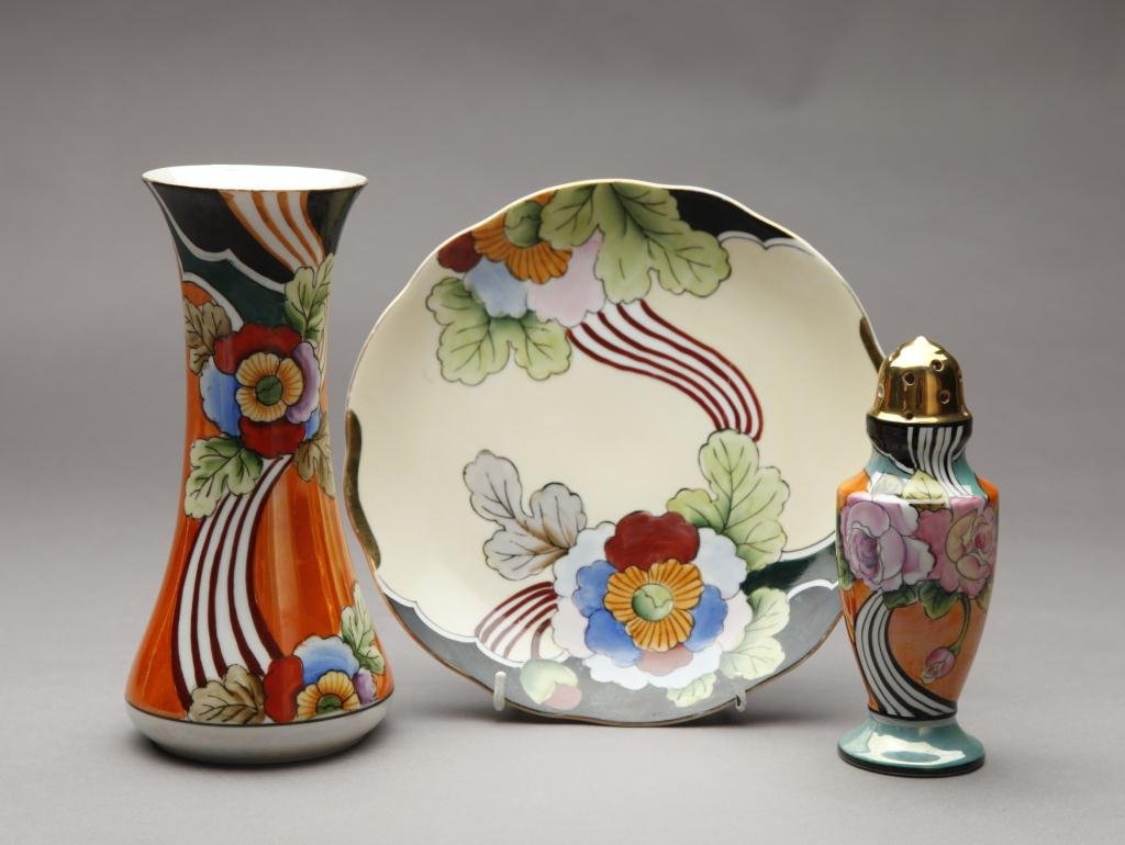 THREE PIECES OF ART DECO NORITAKE: All with racer strip and flowers. Including plate, caster and vase. Green & Red Blossom, H of vase 22 cm. (8 3/4 in.)
