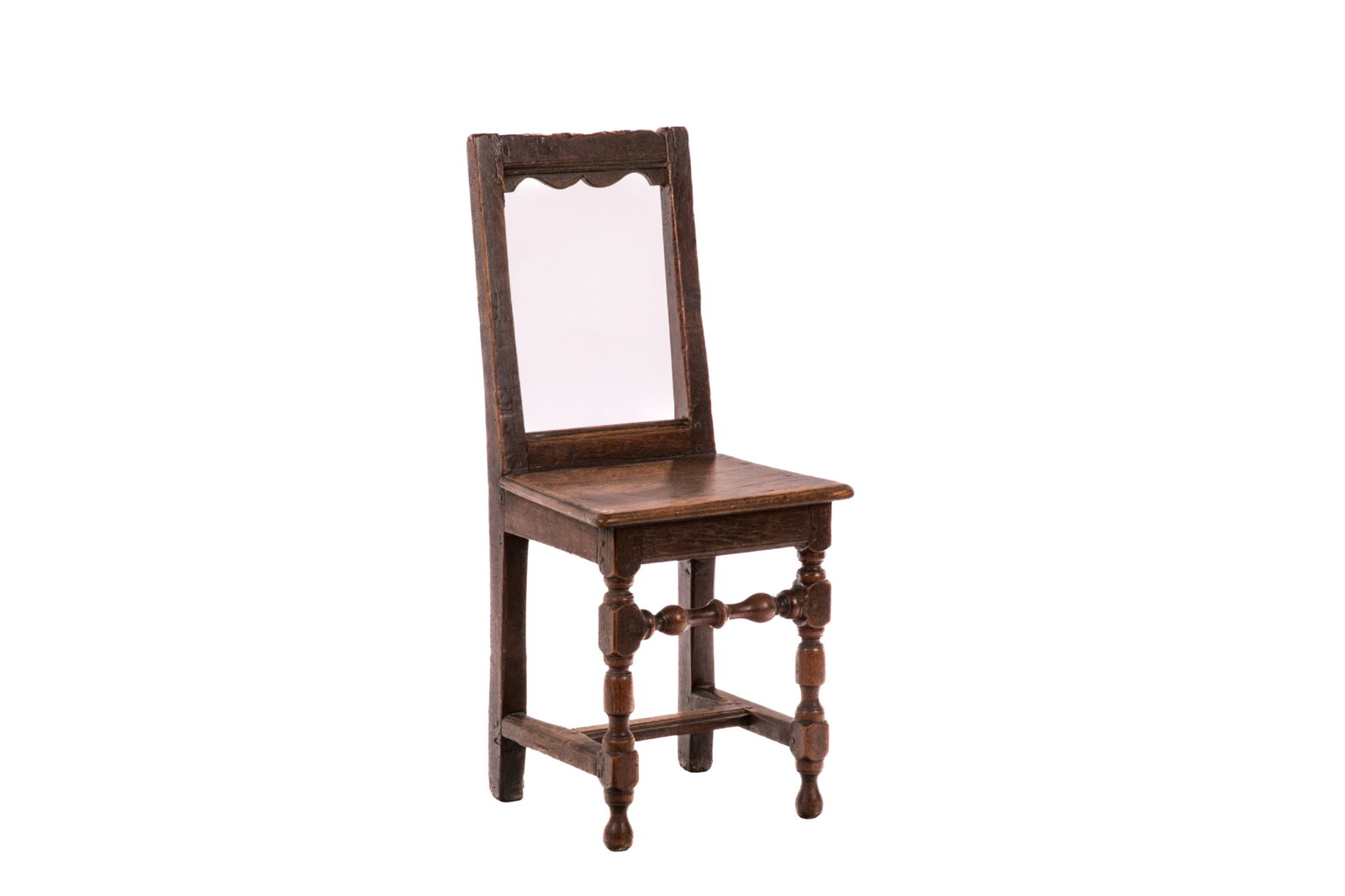 MID 17th C FRENCH OAK MONASTERY CHAIR: Carved wood frame with open back. Retail label to underside. c.1650. H. 34" W. 15 3/4" D. 16"