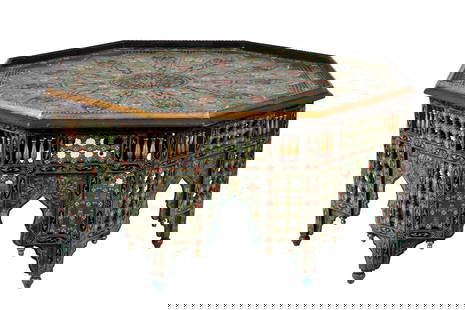 HEXAGONAL PAINTED MOROCCAN COFFEE TABLE: Decorative painted table in greens, pinks and with gilt accents, highly ornate with roundel top, first half 20th C, probably Moroccan or Indian. H. 23". W. 49".