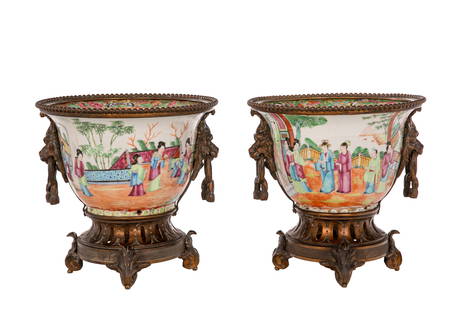 PAIR OF CHINESE CANTON PORCELAIN & BRONZE URNS: Chinese porcelain and enamel decorated jardinieres in the famille rose palette with bronze mounts. H. 23.3 cm (9 1/4 in.)