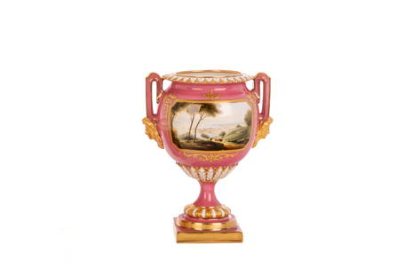 ROYAL WORCESTER PORCELAIN LANDSCAPE VASE: A pink ground English porcelain vase with a hand painted landscape scene with white foliate and gilded accents. Marked to the underside Royal Worcester England 2383. H. 6 1/2 in.