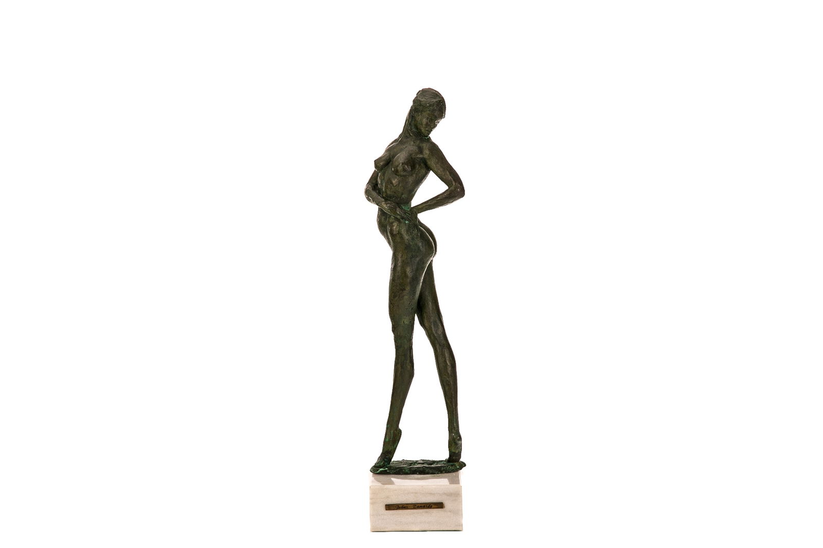 JULIUS DAMASDY STANDING NUDE BRONZE: Patinated bronze of a nude woman standing in a pseudo contrapposto pose, but with an exaggerated turn to look over her left shoulder. By Canadian/Hungarian artist Julius Damasdy (b.1937). Set up on a