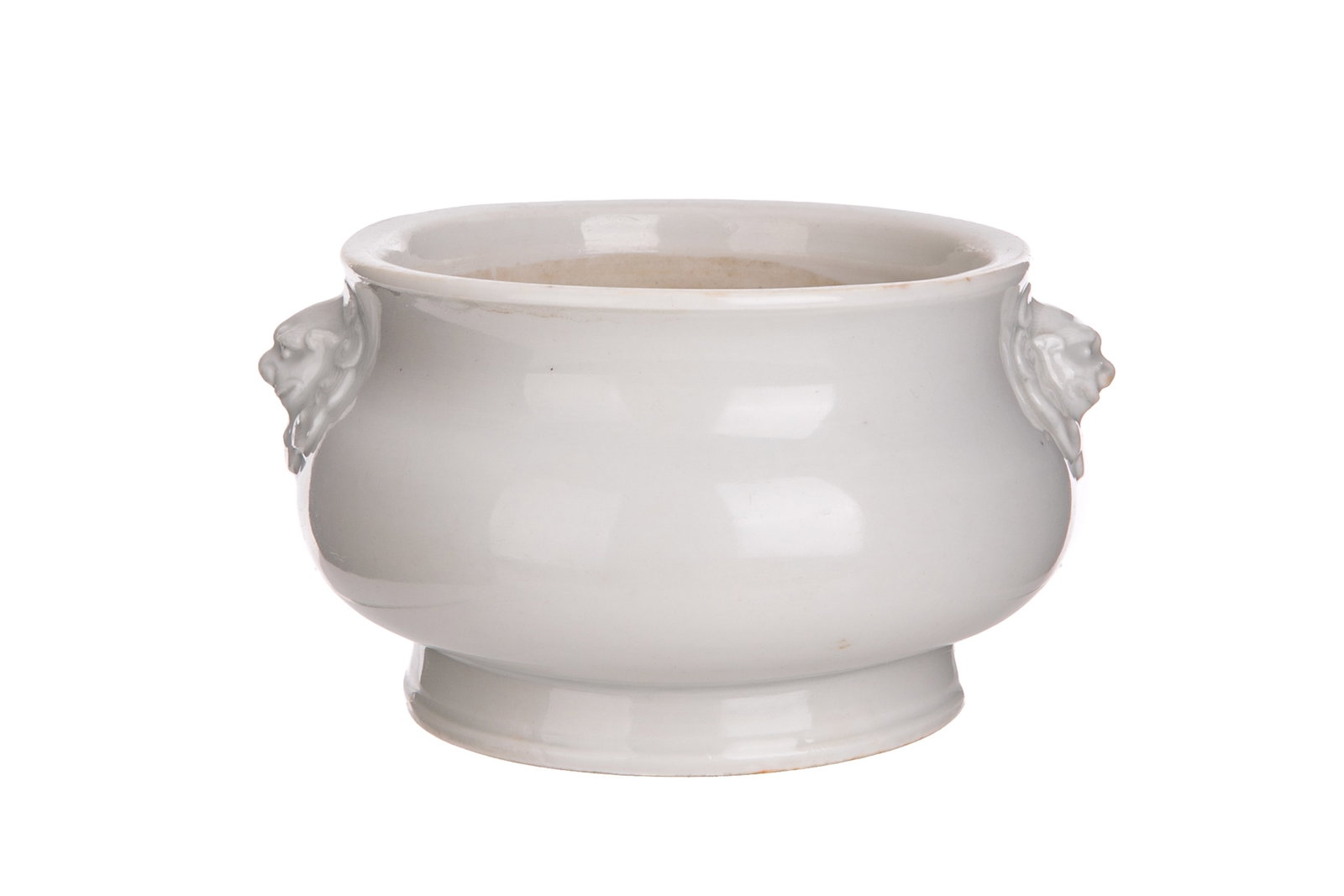 MING DEHUA PORCELAIN CENSER: Chinese, late Ming dynasty, a Dehua porcelain censer with lion-masks handles, having a square seal to its base reading an zhi. H. 7.9 cm (3 1/8 in.), Width. 13.8 cm (5 3/8 in.) Similar: LOT 438 of "Ch