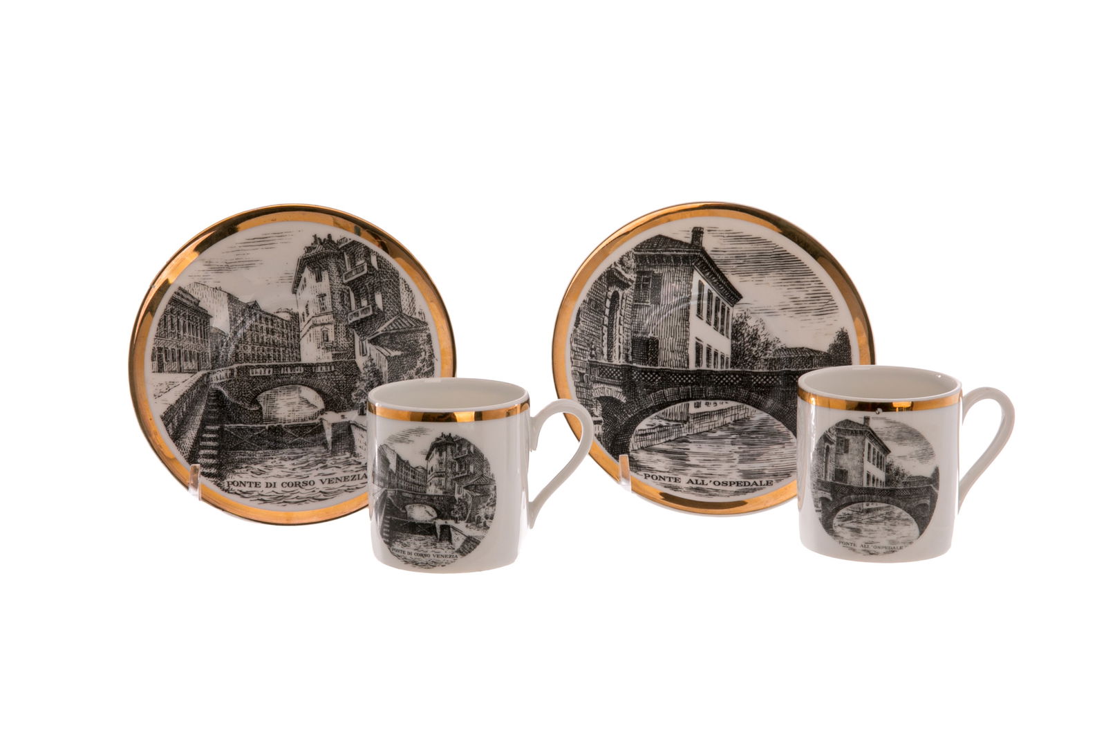 TWO FORNASETTI PORCELAIN DEMITASSE CUPS & SAUCERS: Depicting Italian bridges: Ponte di corso Venezia and Ponte all'Ospedale. Marked to the underside I Ponti Del Naviglio Di Milano. Dia. of saucer: 11.4 cm (4 1/2 in.)