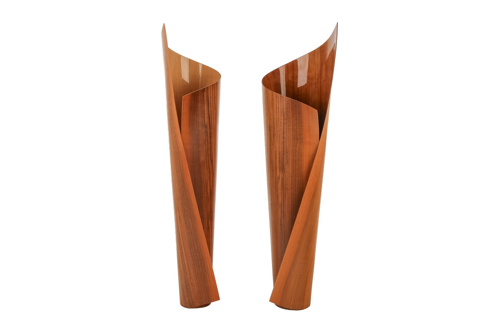 PAIR OF MCM CANADIAN WALNUT VASES: Pair of moulded walnut veneered sheets in a swirled pattern forming a decorative vase.