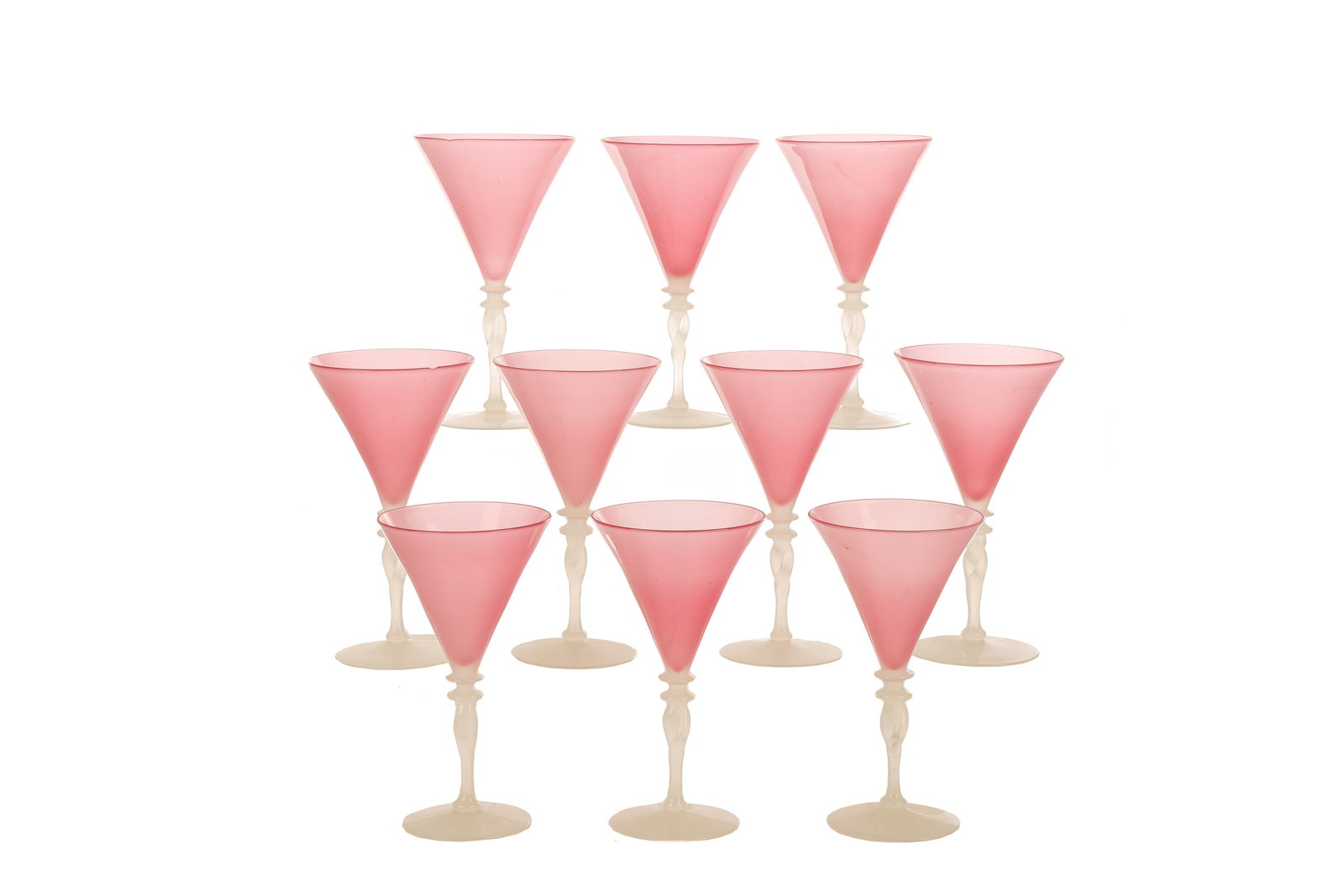 10 PCS STEUBEN OPAQUE PINK & WHITE WINE GLASSES: Unsigned, wine glasses designed by Frederick Carder. Group of ten American art glass wine glasses in opaque pink with white stems. 20th C. H. 17.8 cm (7 in.)