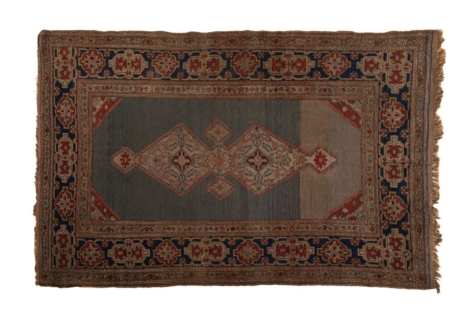 ANTIQUE TURKISH GORDES RUG: Wool on cotton construction circa 1910. 5' 10" x 3' 8"
