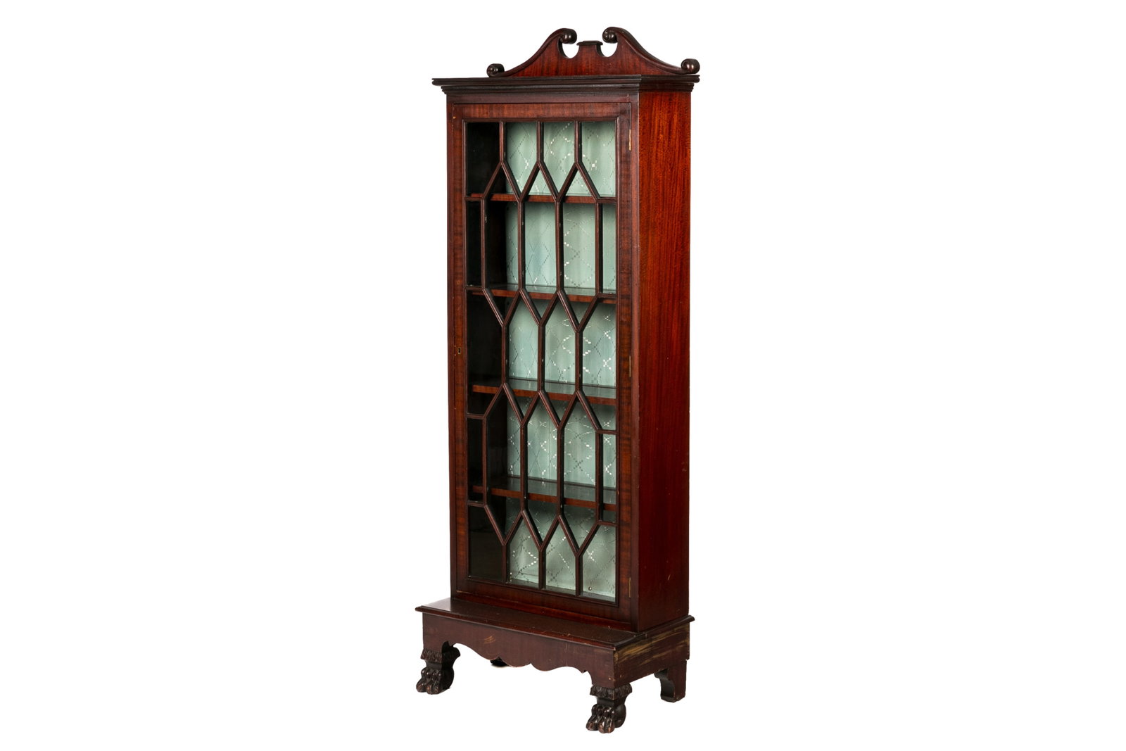 19th C ENGLISH MAHOGANY CHINA CABINET: Unusual form with a long single glazed paneled door, Chippendale influenced top and claw feet. Late 19th C.H.: 68'' W.: 25'' D.: 14''