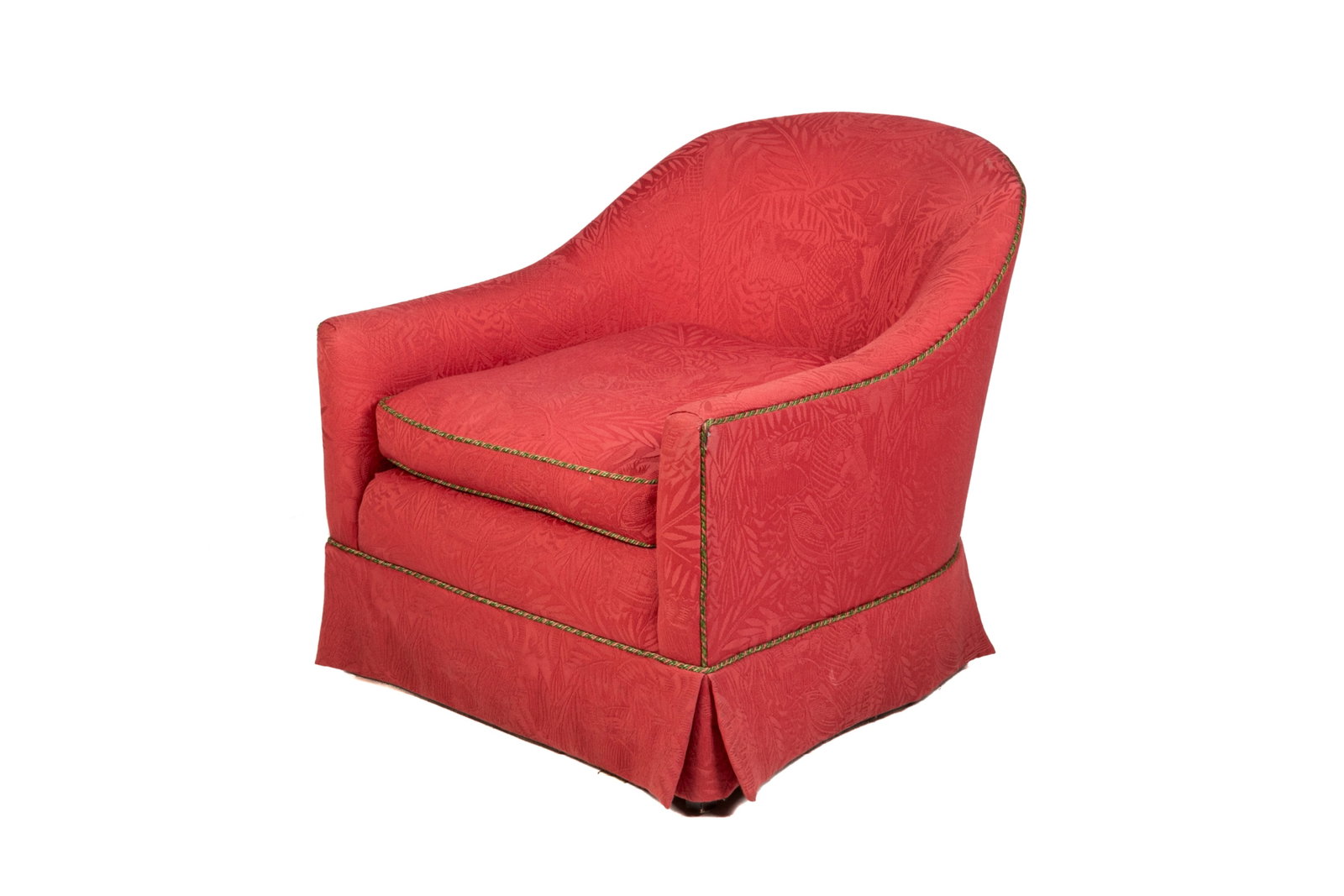 RED UPHOLSTERED TUB CHAIR: Foliate fabric with rope piping, 20th / 21st C. H.: 29" W.: 29" D.: 34"