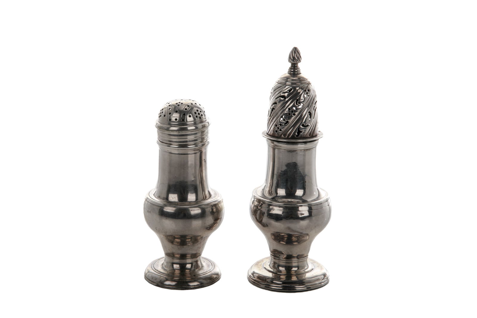 TWO GEORGE III SILVER CASTERS (1 of 4)